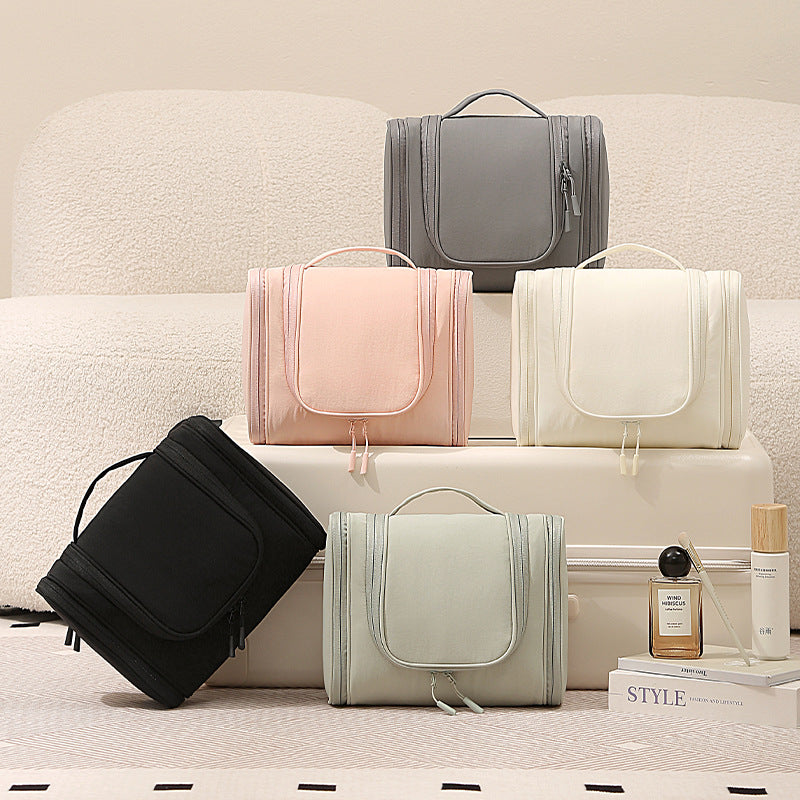 Toilet bag with an extra handle bag