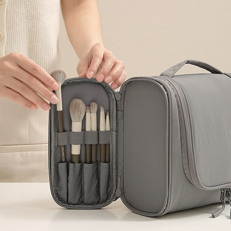 Toilet bag with an extra handle bag